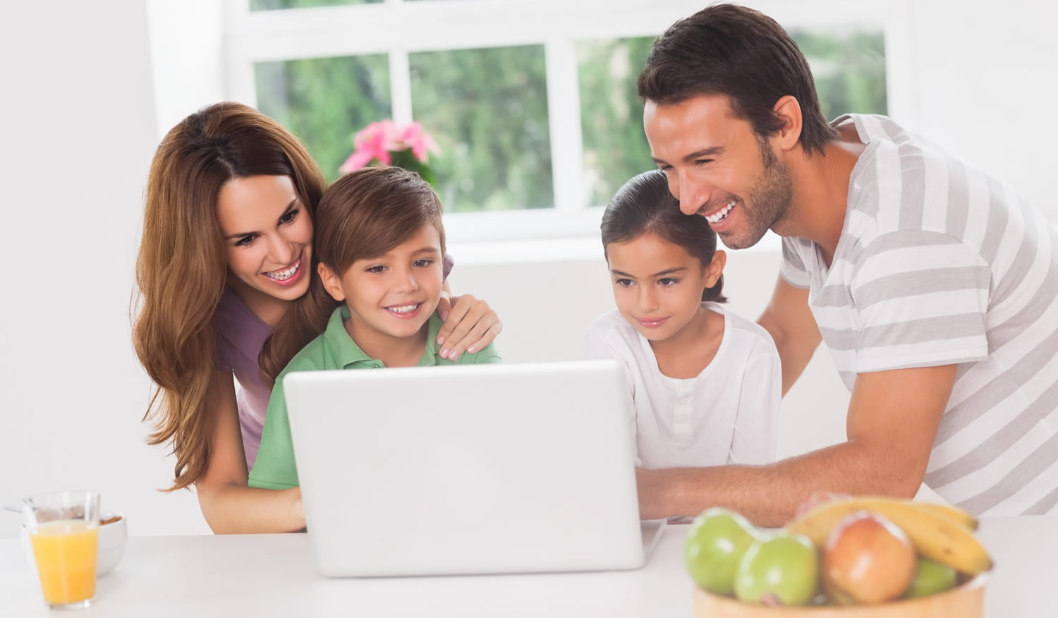 family-at-home-reading-laptop-information-london-city-mortgages